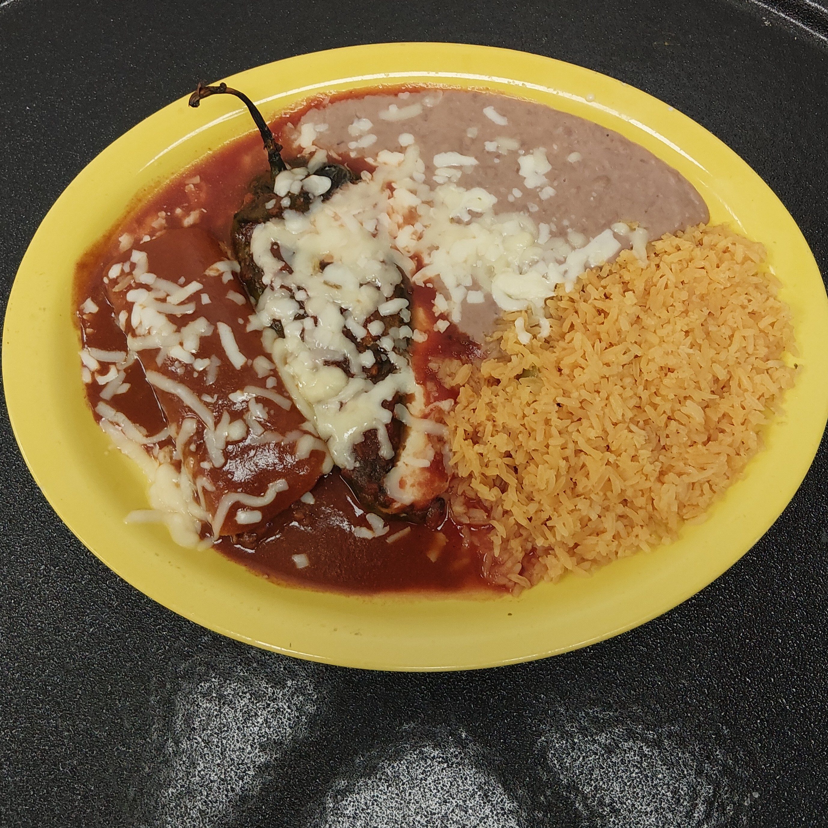 6. Enchilada, Chile Relleno, Rice and Beans.