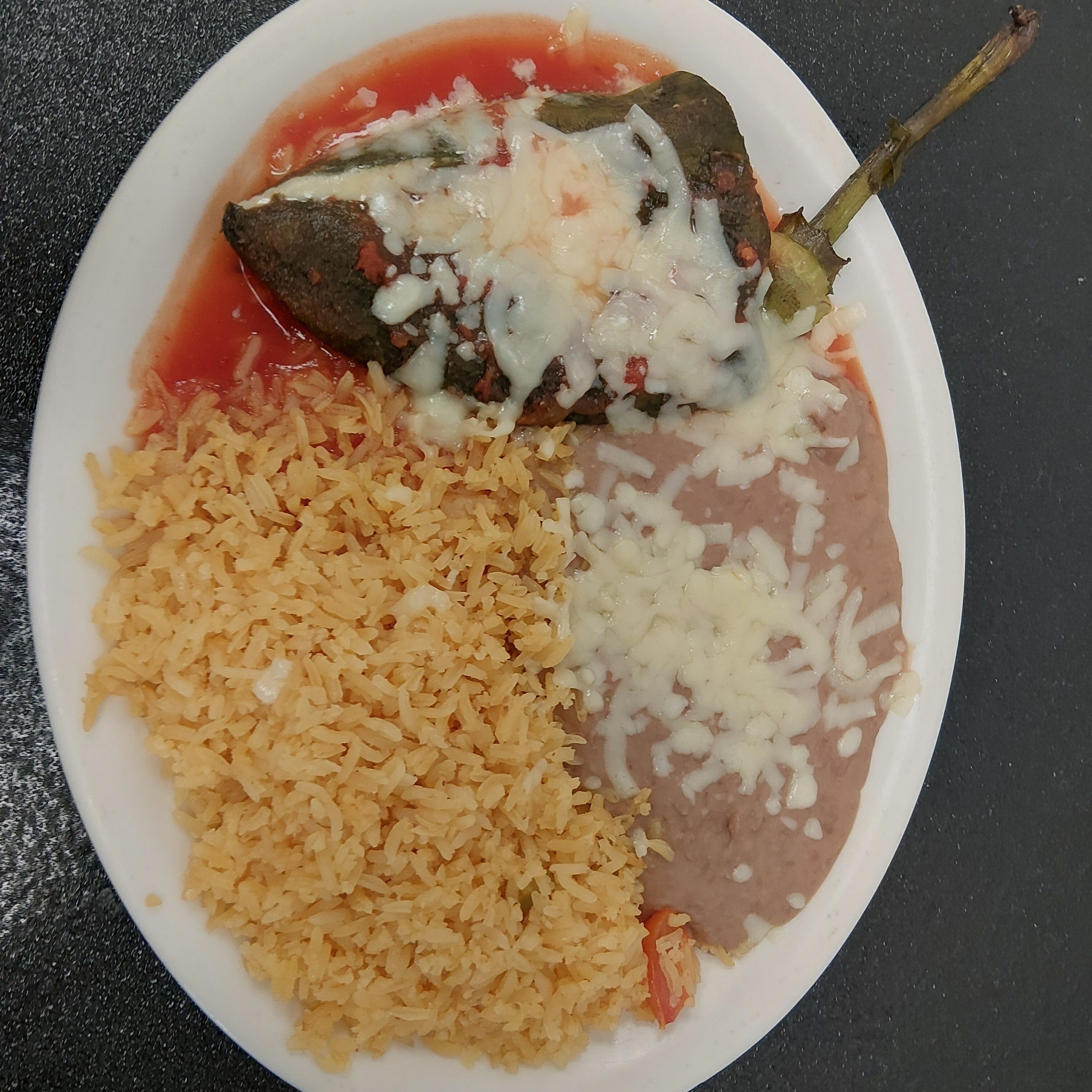 L3. Chile Relleno, Rice and Beans.